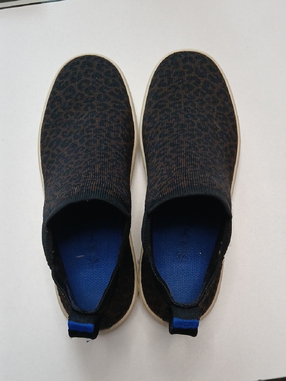 Rothy's Women’s Leopard-Print Slip-On Sneakers in Black and Brown